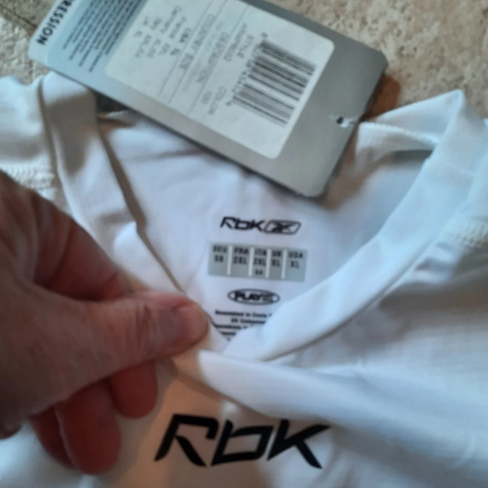 New RBK white compression shirt XL youth play dry sports